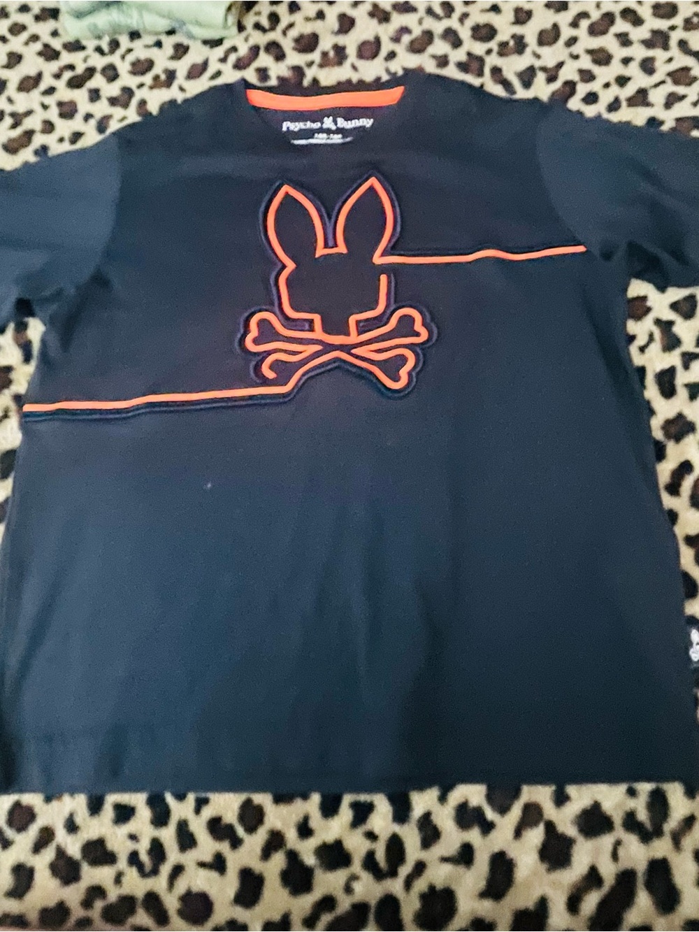 Psycho Bunny Kids Black Tee with Orange Outline Skull-and-Bunny